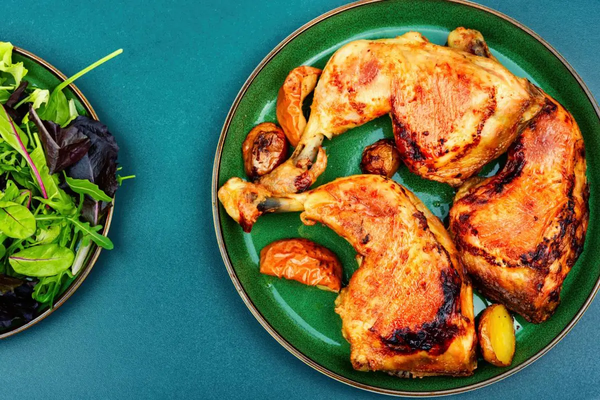 Grilled chicken meat on the plate. Cooked roasted chicken legs