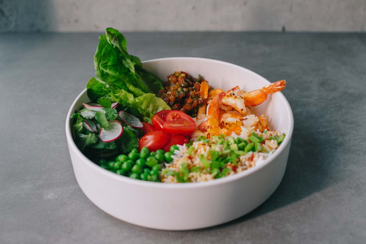 Poke bowl with rice and shrimp.